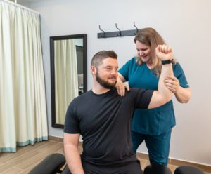 Frozen shoulder treatment by chiropractic and physiotherapy