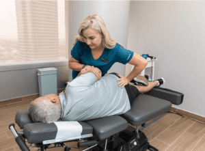 Chiropractic adjustment of sacroiliac-joint for lower back pain